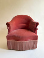 Fauteuil crapaud en velours rose-orangé