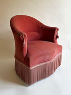 Fauteuil crapaud en velours rose-orangé