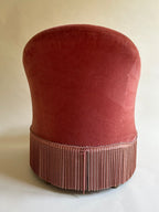 Fauteuil crapaud en velours rose-orangé