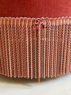 Fauteuil crapaud en velours rose-orangé
