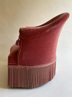Fauteuil crapaud en velours rose-orangé