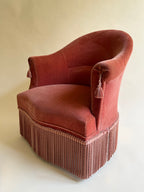 Fauteuil crapaud en velours rose-orangé