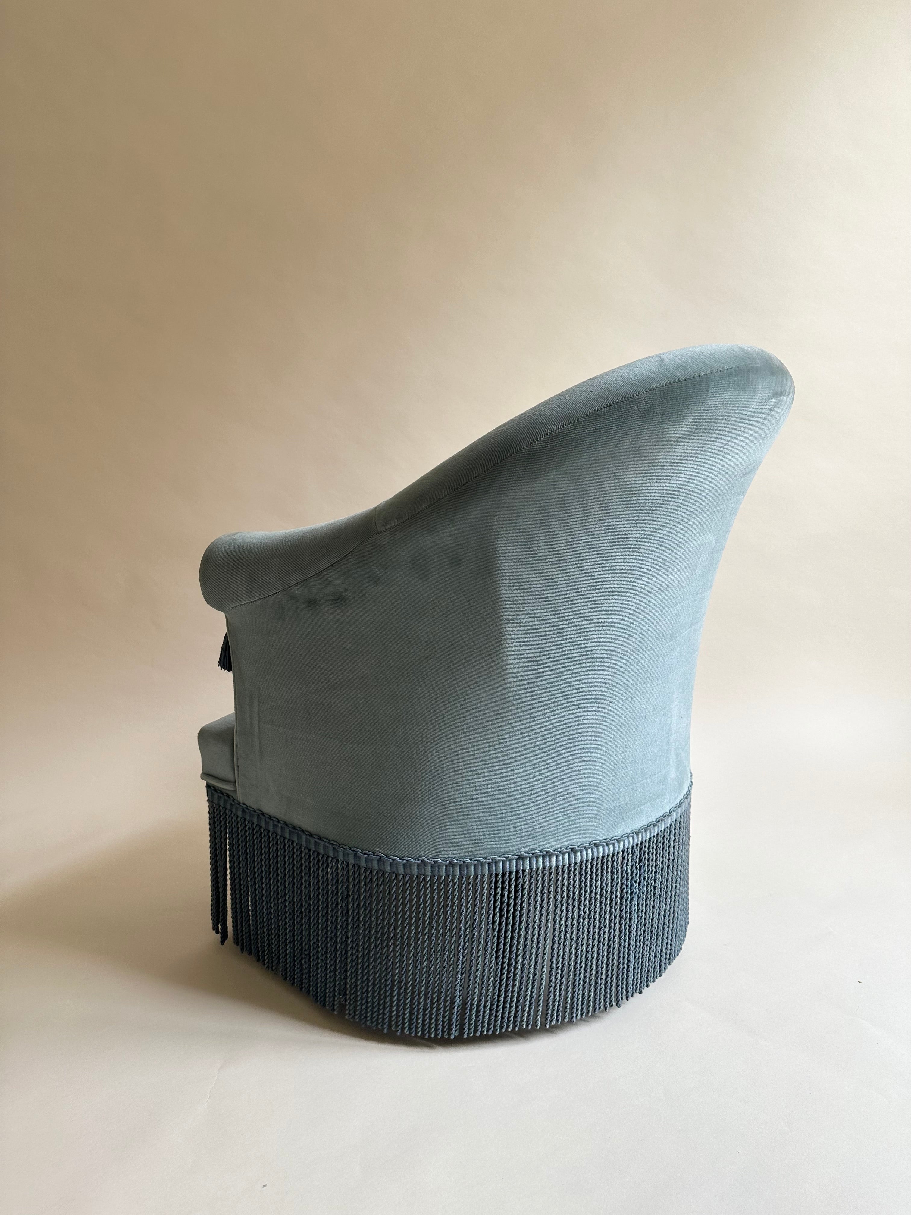 Fauteuils crapauds en velours bleu