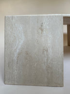 Table basse oeil en travertin