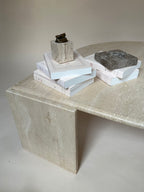 Table basse oeil en travertin