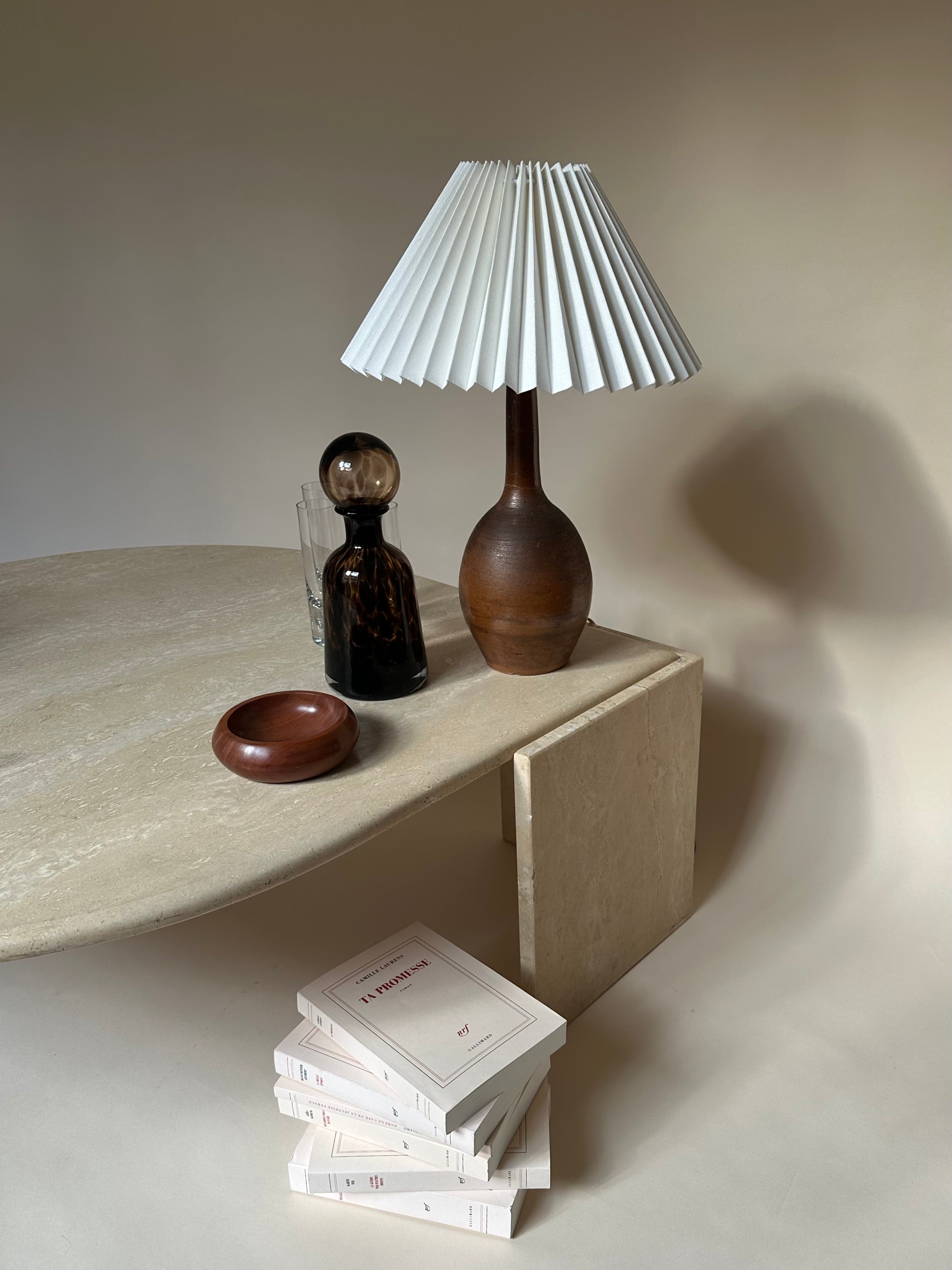 Table basse oeil en travertin