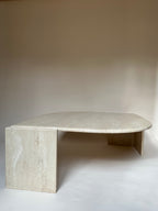 Table basse oeil en travertin