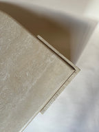 Table basse oeil en travertin