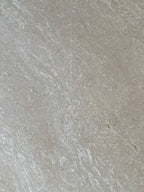 Table basse oeil en travertin