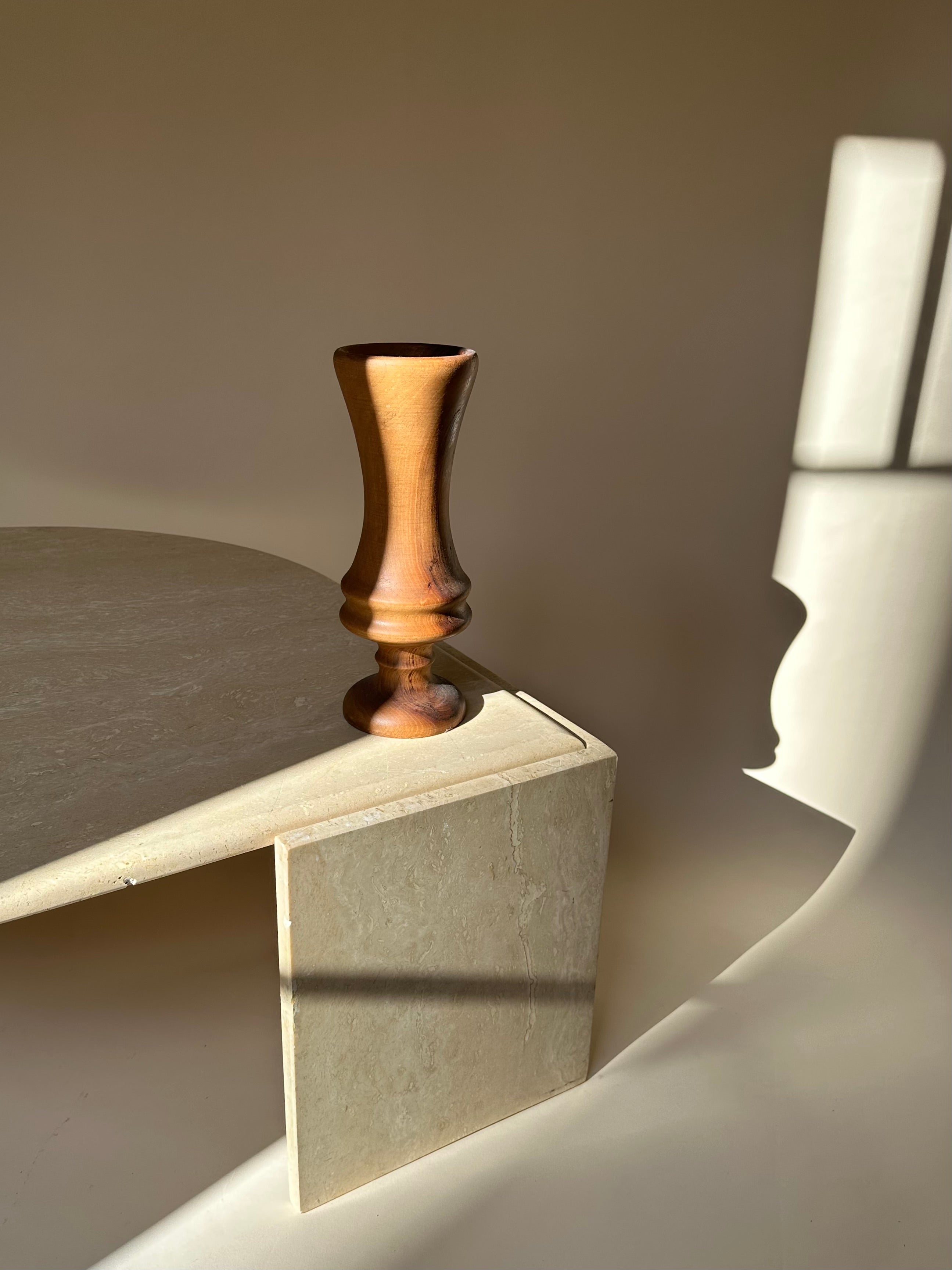 Table basse oeil en travertin