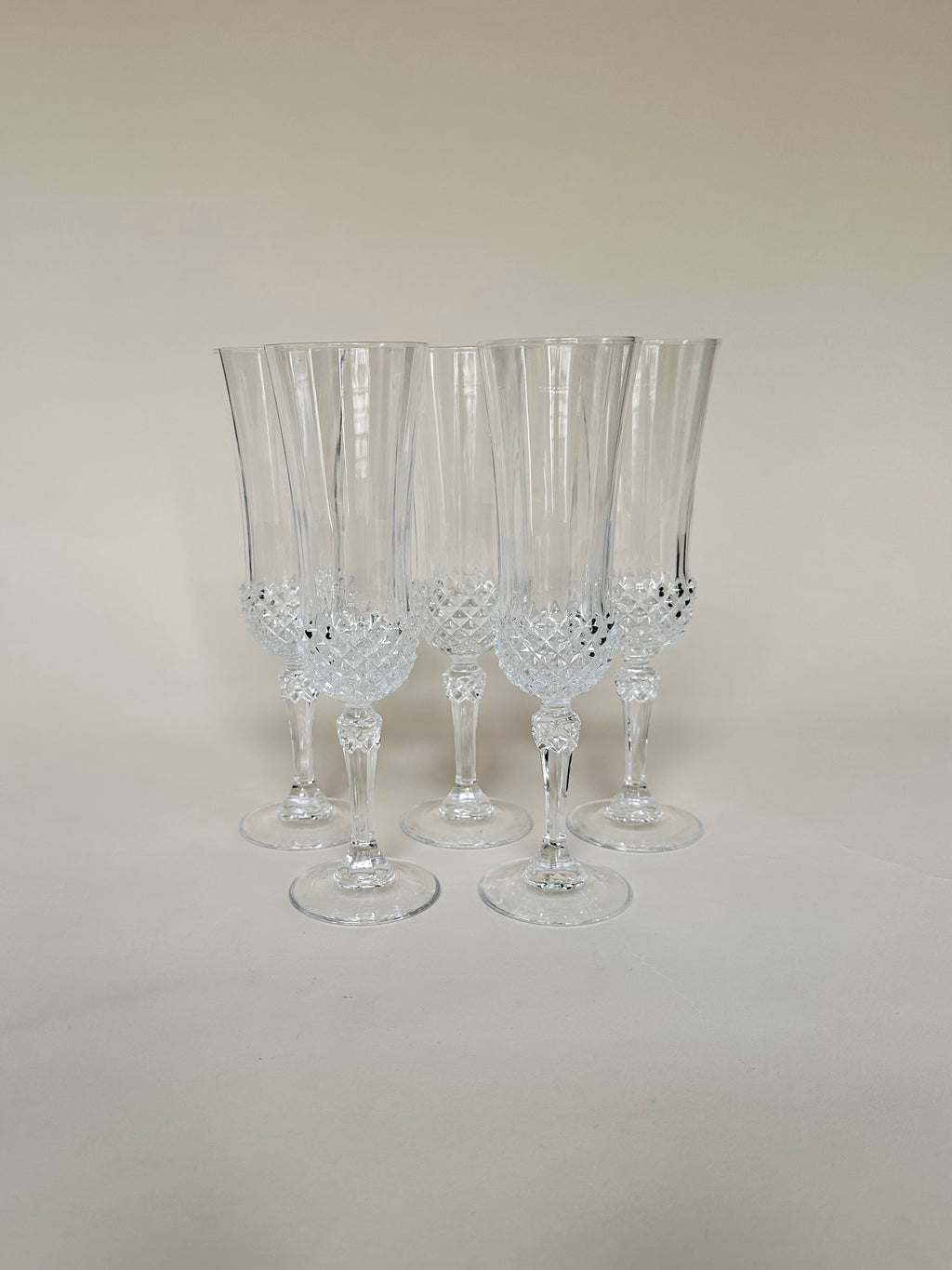 Set de cinq flûtes en verre