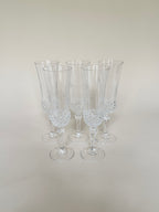 Set de cinq flûtes en verre