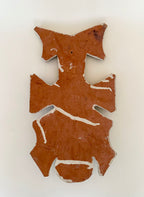 Masque mural en terre cuite peinte