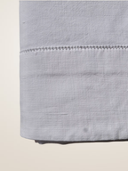Drap ancien en métis, monogrammé FS avec jour